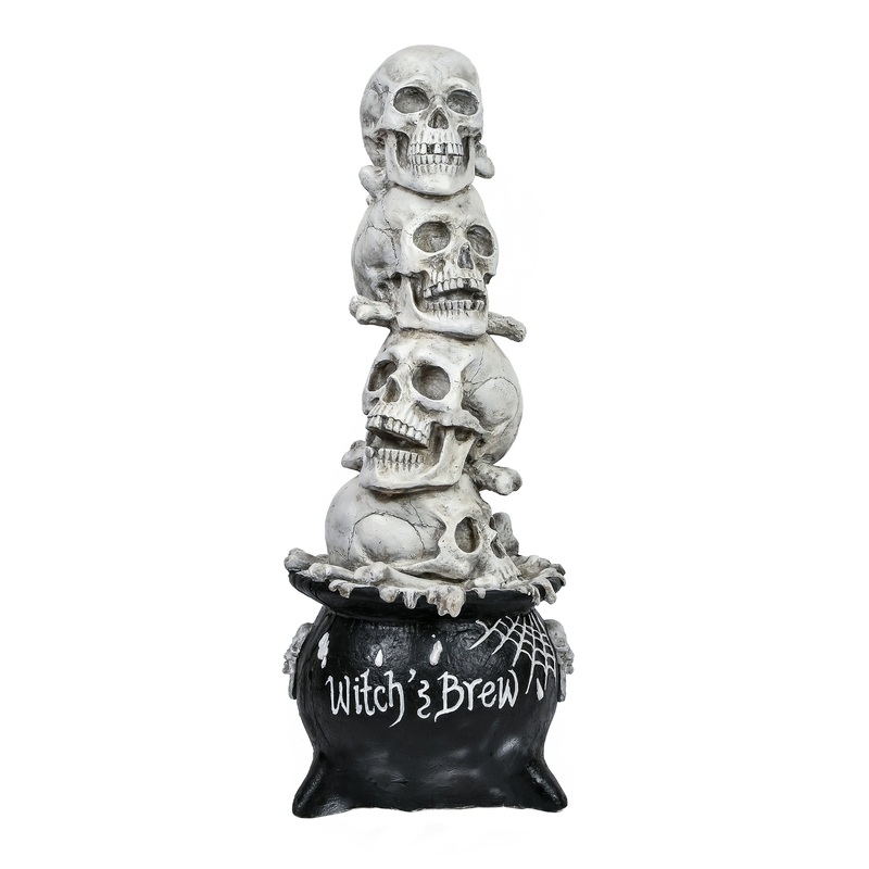 38 in. Halloween Stacked Skulls in a Cauldron Tabletop Decoration